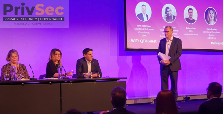 Panel discussion on privacy, security, and governance at conference.