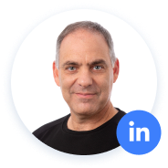 Man with LinkedIn logo, wearing black shirt.
