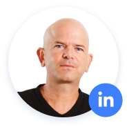 Bald man with a LinkedIn icon.