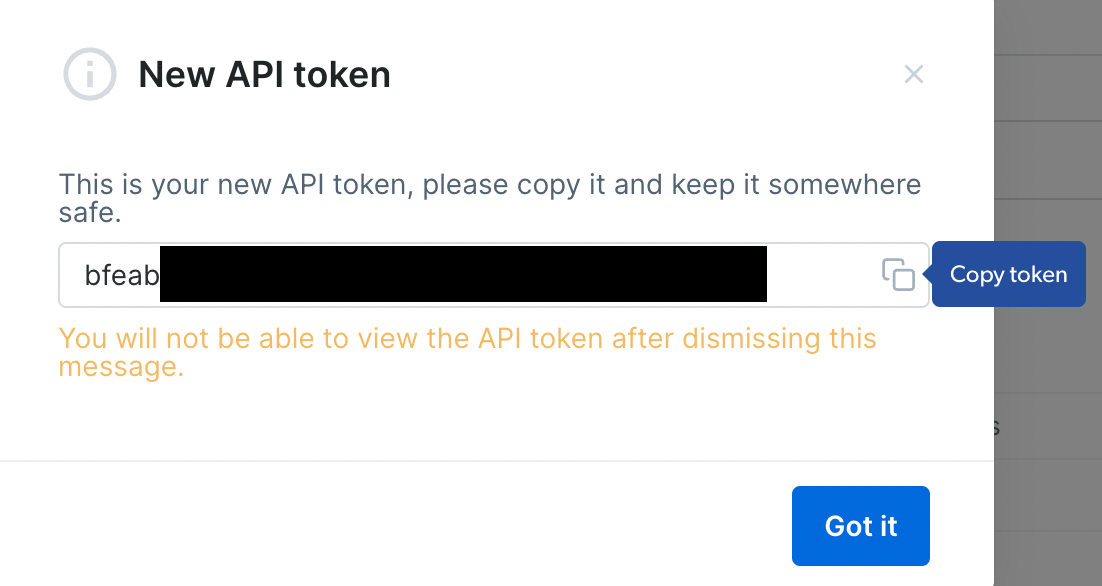 New API token popup; copy button, partially hidden token.