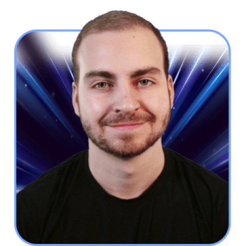 Smiling man in front of blue abstract background.